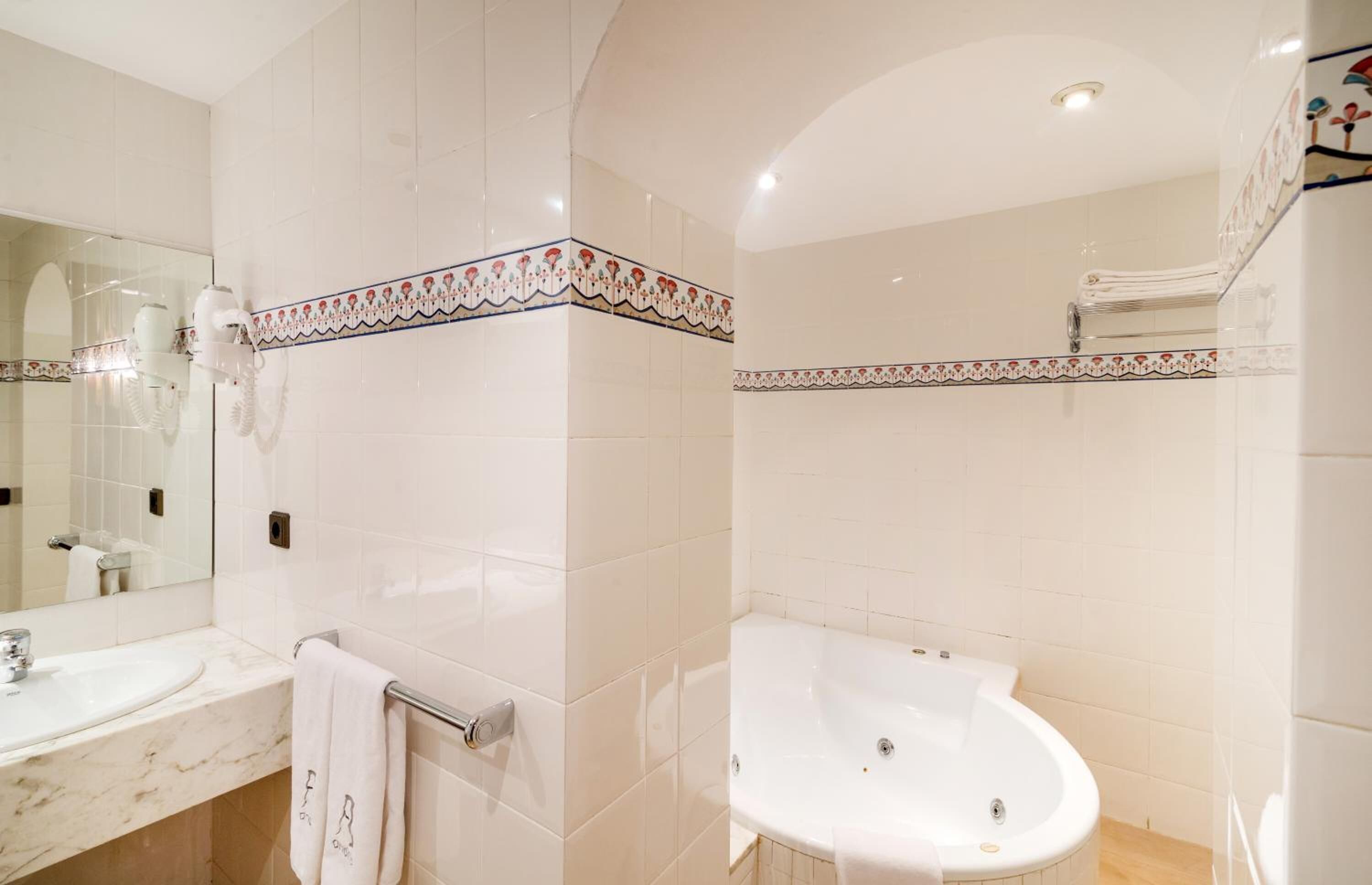 free toiletries, hair dryer, bidet, towels