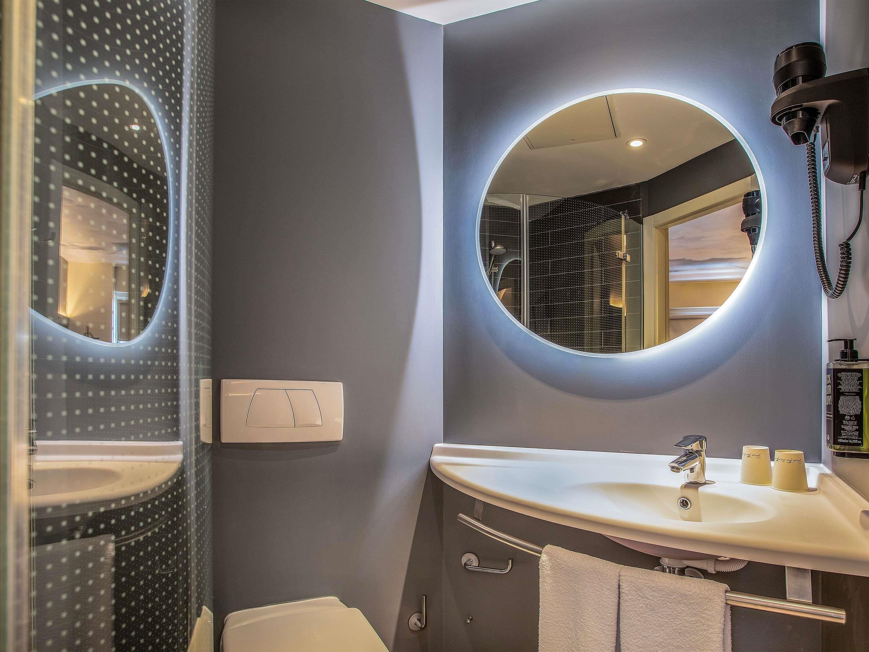 shower, eco-friendly toiletries, hair dryer, towels