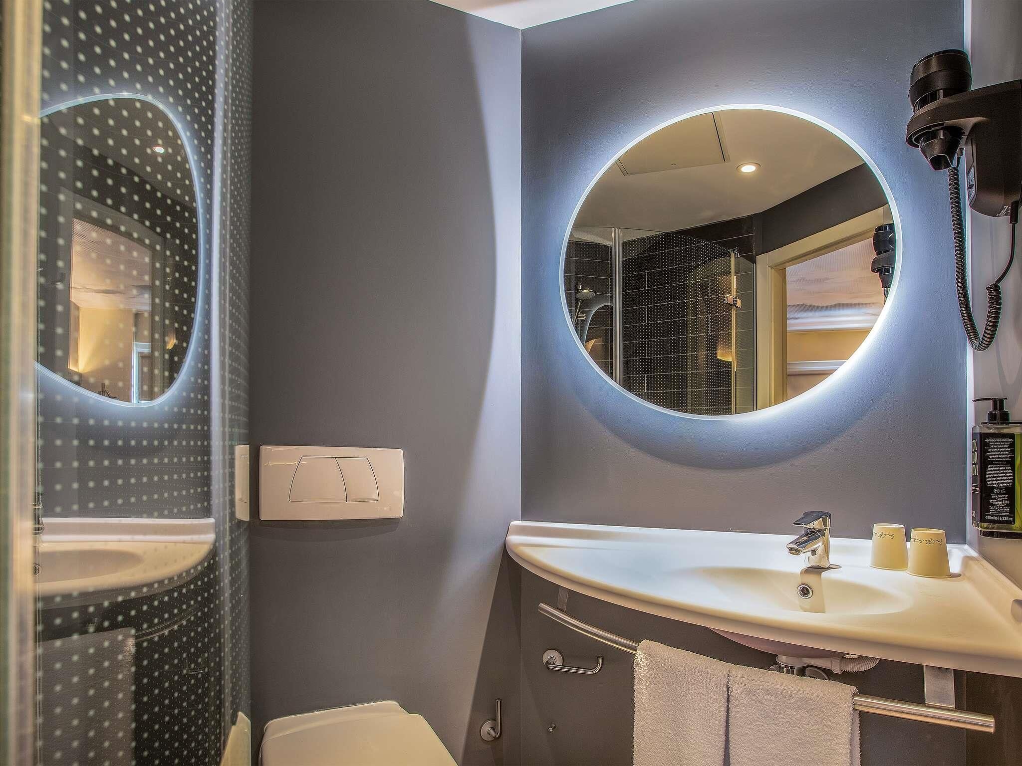 Blackout curtains, iron/ironing board, free WiFi, bed sheets