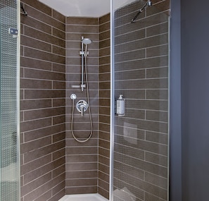 Shower, eco-friendly toiletries, hair dryer, towels