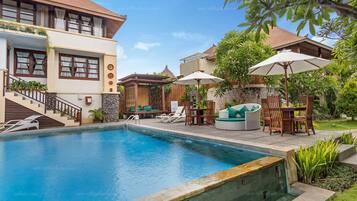 2 outdoor pools, open 7:00 AM to 8:00 PM, pool loungers