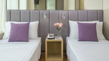 Habitació amb dos llits individuals Deluxe | Caixa forta a l'habitació, cortines opaques i planxa i posts de planxar