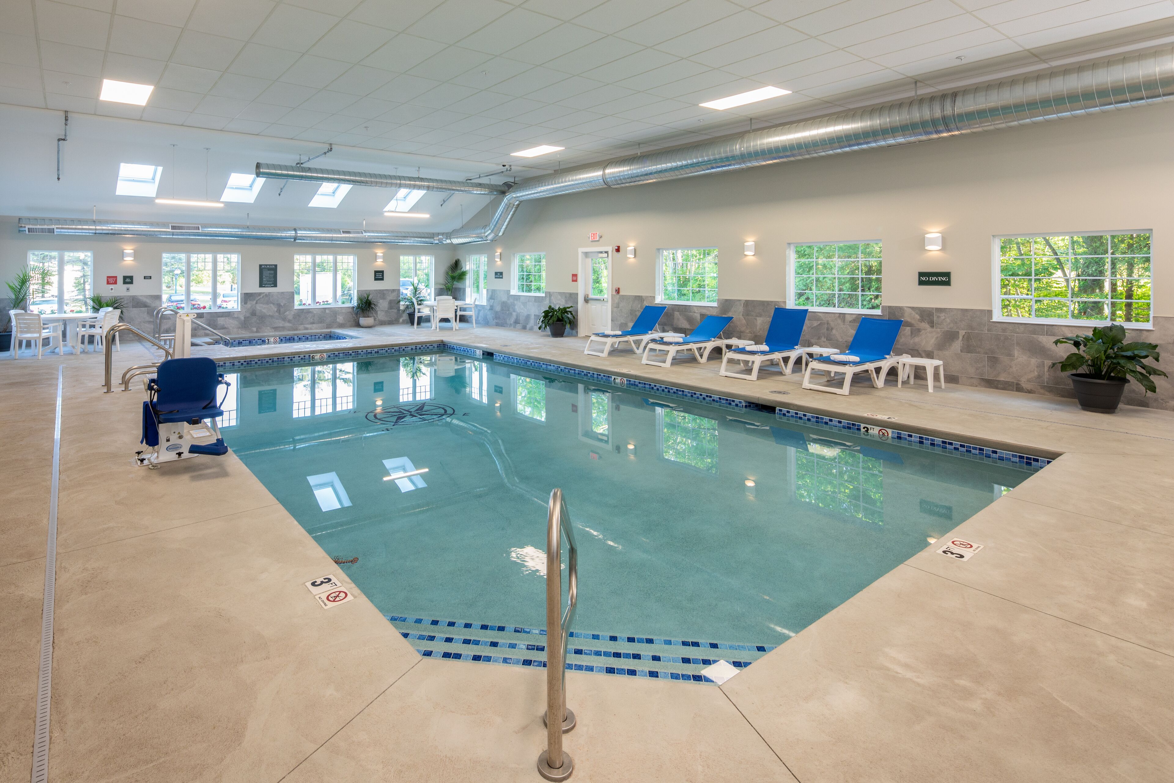 Indoor pool, open 8:30 AM to 8:30 PM, pool loungers