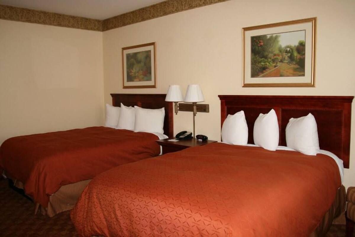 down duvets, pillow-top beds, in-room safe, desk