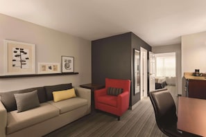 Down comforters, pillowtop beds, in-room safe, desk