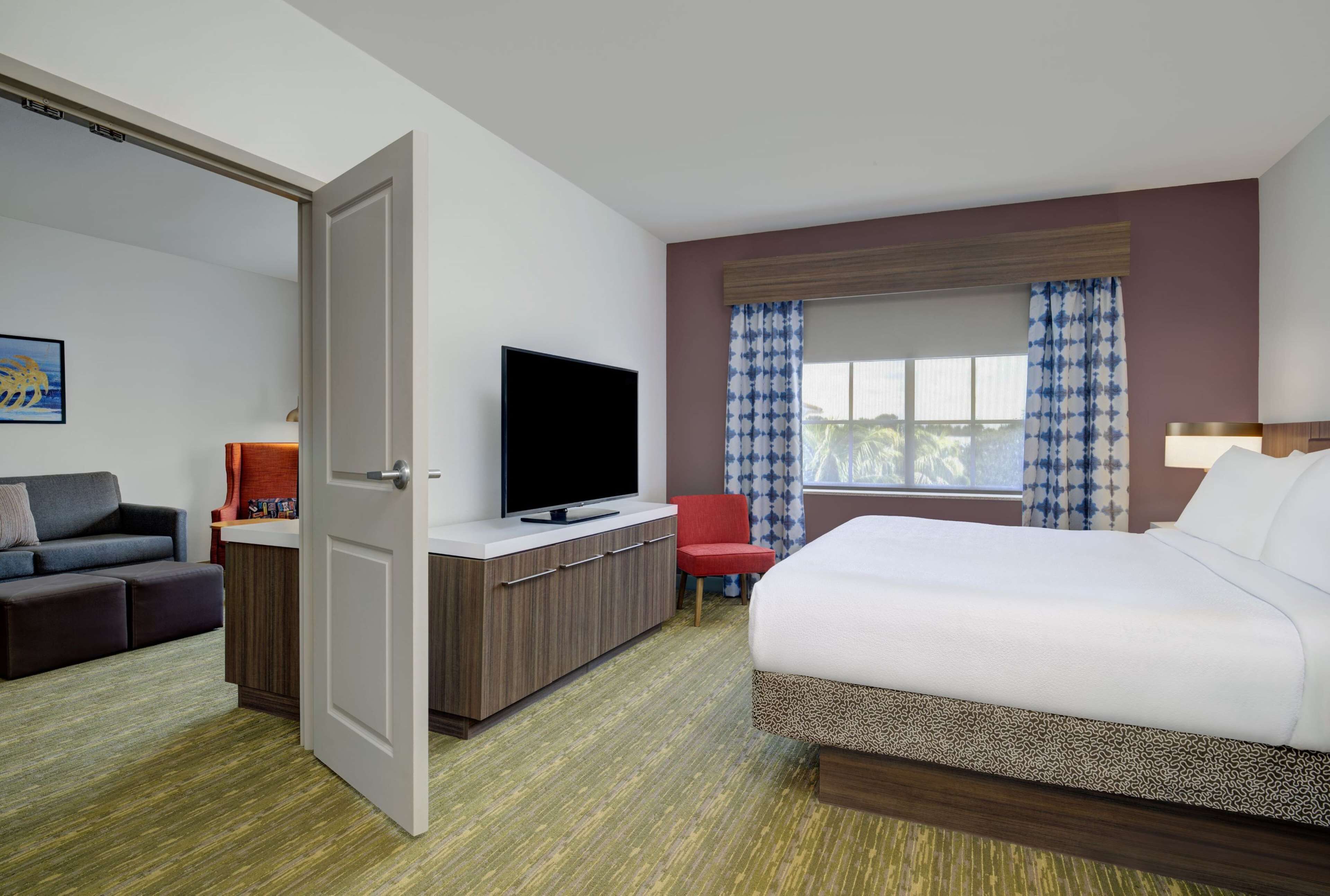 one bedroom suite, one king and one sofa bed | in-room safe, desk, iron/ironing board, free cots/infant beds