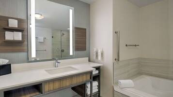 One Bedroom Suite, One King and One Sofa Bed | Bathroom | Combined shower/tub, free toiletries, towels
