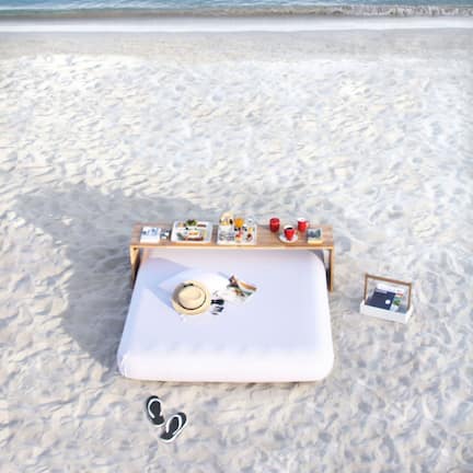 On the beach, white sand, sun-loungers, beach umbrellas