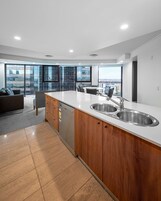 Desk, laptop workspace, iron/ironing board, cots/infant beds