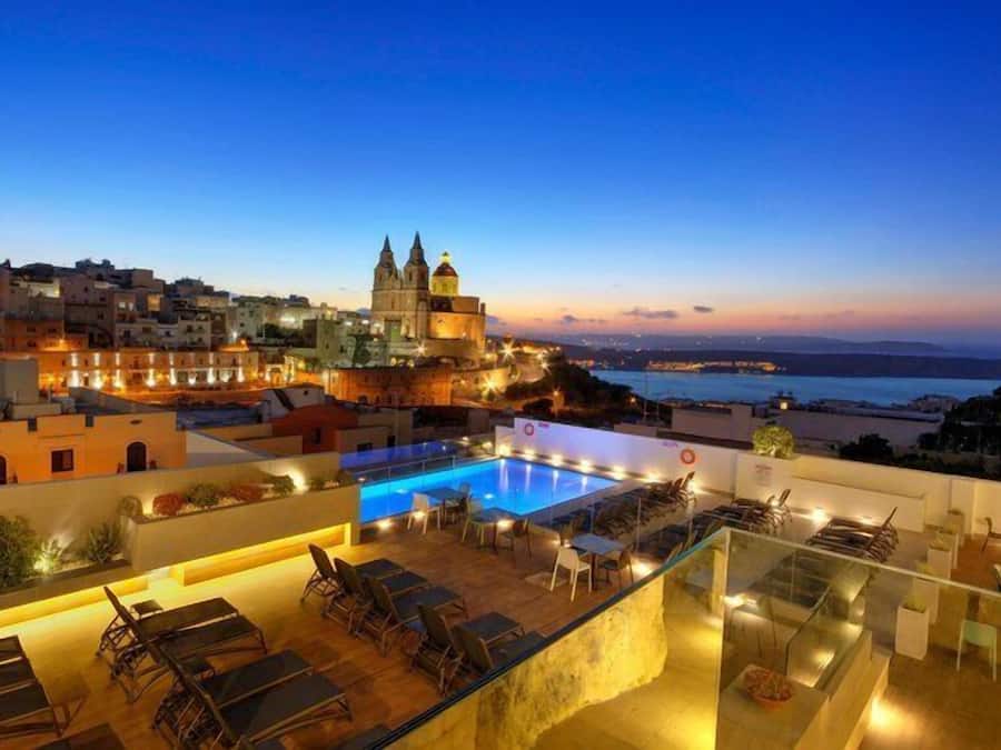 Indoor pool, 2 outdoor pools, open 8 AM to 8 PM, pool umbrellas