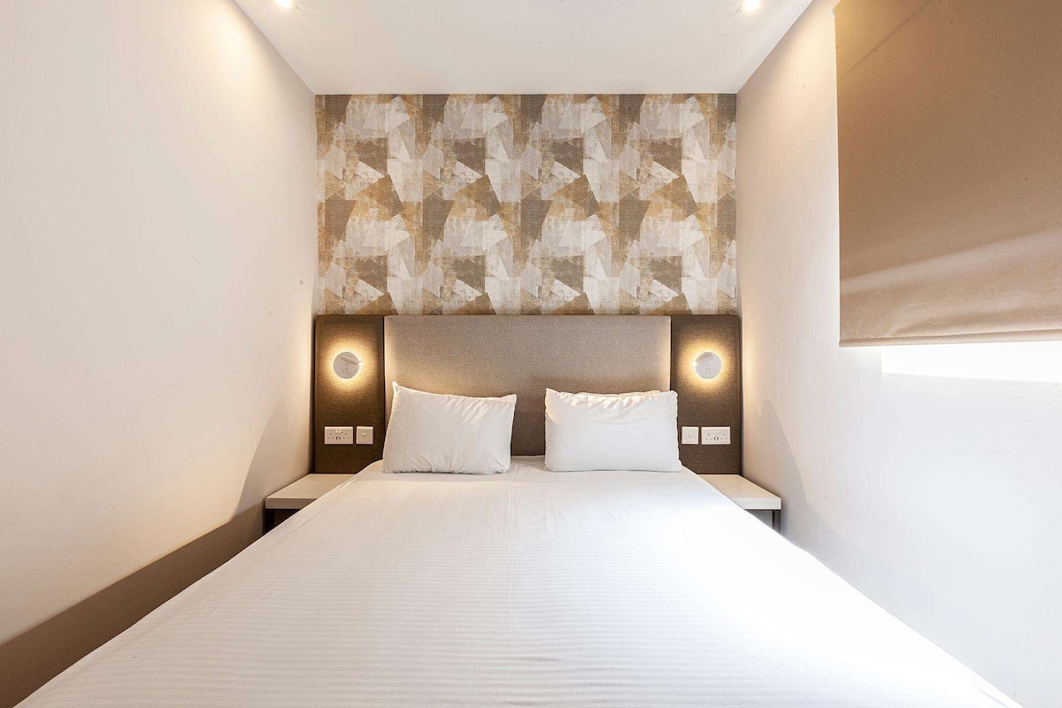 Standaard appartement, 2 slaapkamers | 1 slaapkamer, een minibar, een kluis op de kamer, een bureau