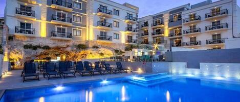 Indoor pool, 2 outdoor pools, open 8 AM to 8 PM, pool umbrellas
