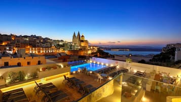 Indoor pool, 2 outdoor pools, open 8 AM to 8 PM, pool umbrellas