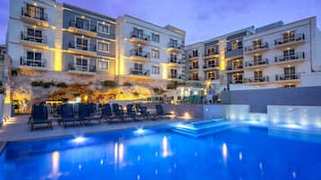 Indoor pool, 2 outdoor pools, open 8 AM to 8 PM, pool umbrellas