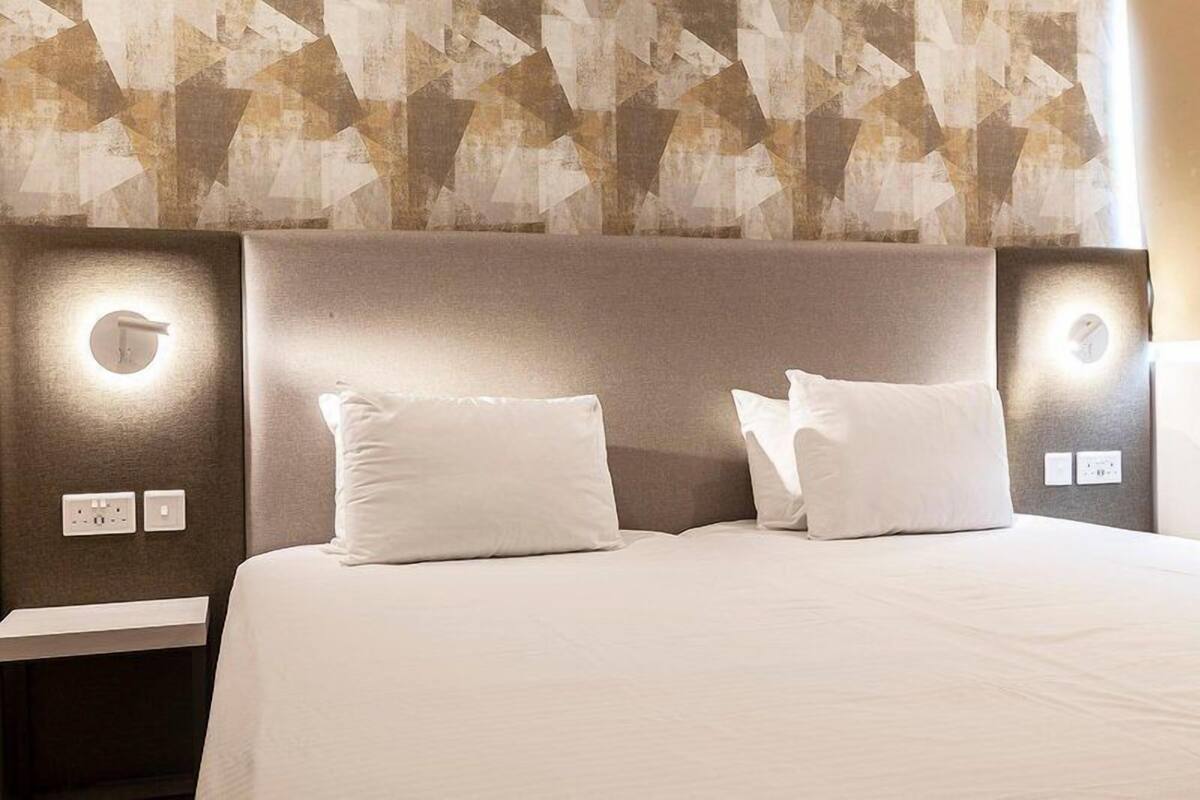 Standard Apartment, 2 Bedrooms | Minibar, in-room safe, desk, blackout drapes