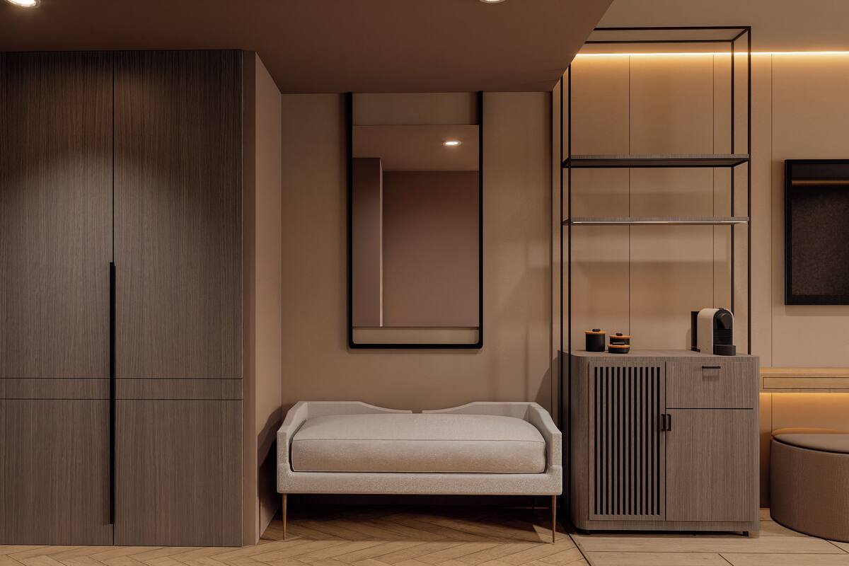 Een moderne slaapkamer met een inbouwkast, nachtkastje en een grote spiegel.