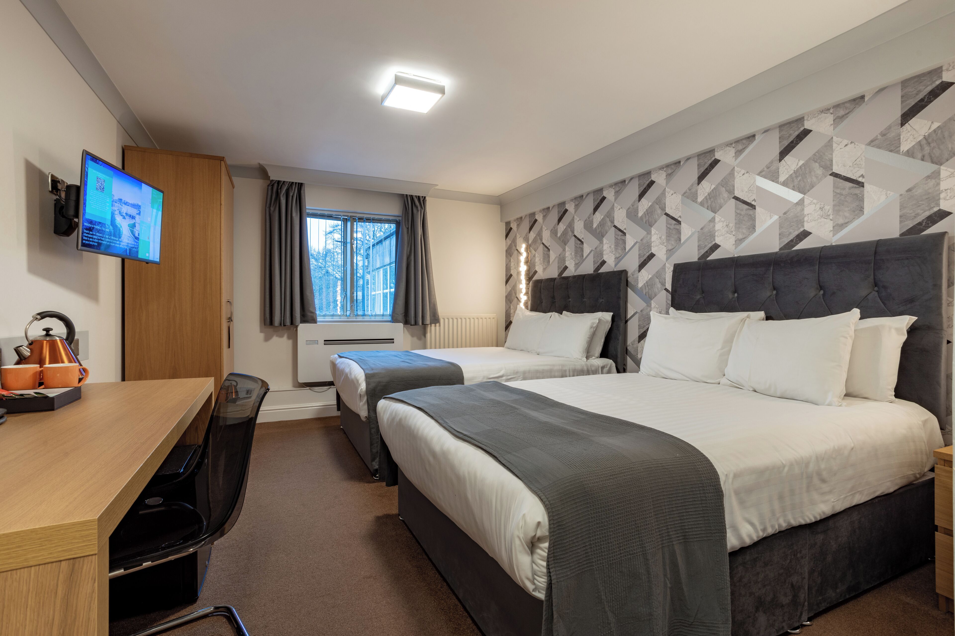 premium family room with two double beds | hypo-allergenic bedding, in-room safe, desk, laptop workspace