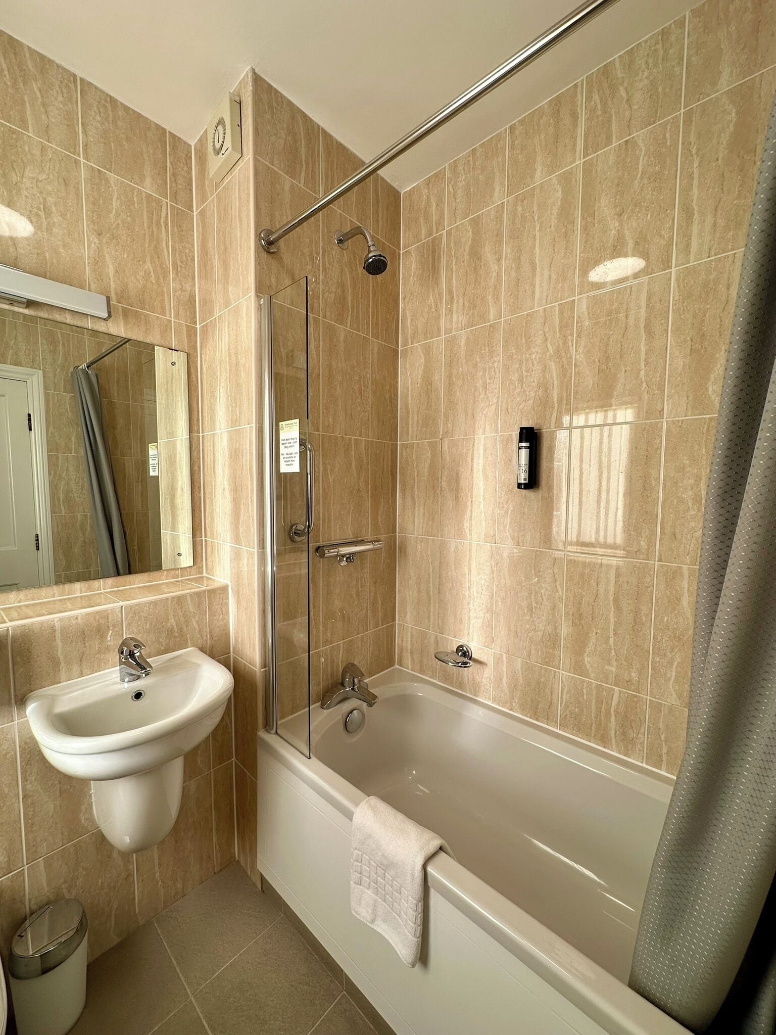 eco-friendly toiletries, hair dryer, towels