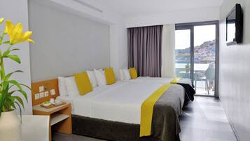 Standard Triple Room, City View | Minibar, in-room safe, soundproofing, free WiFi