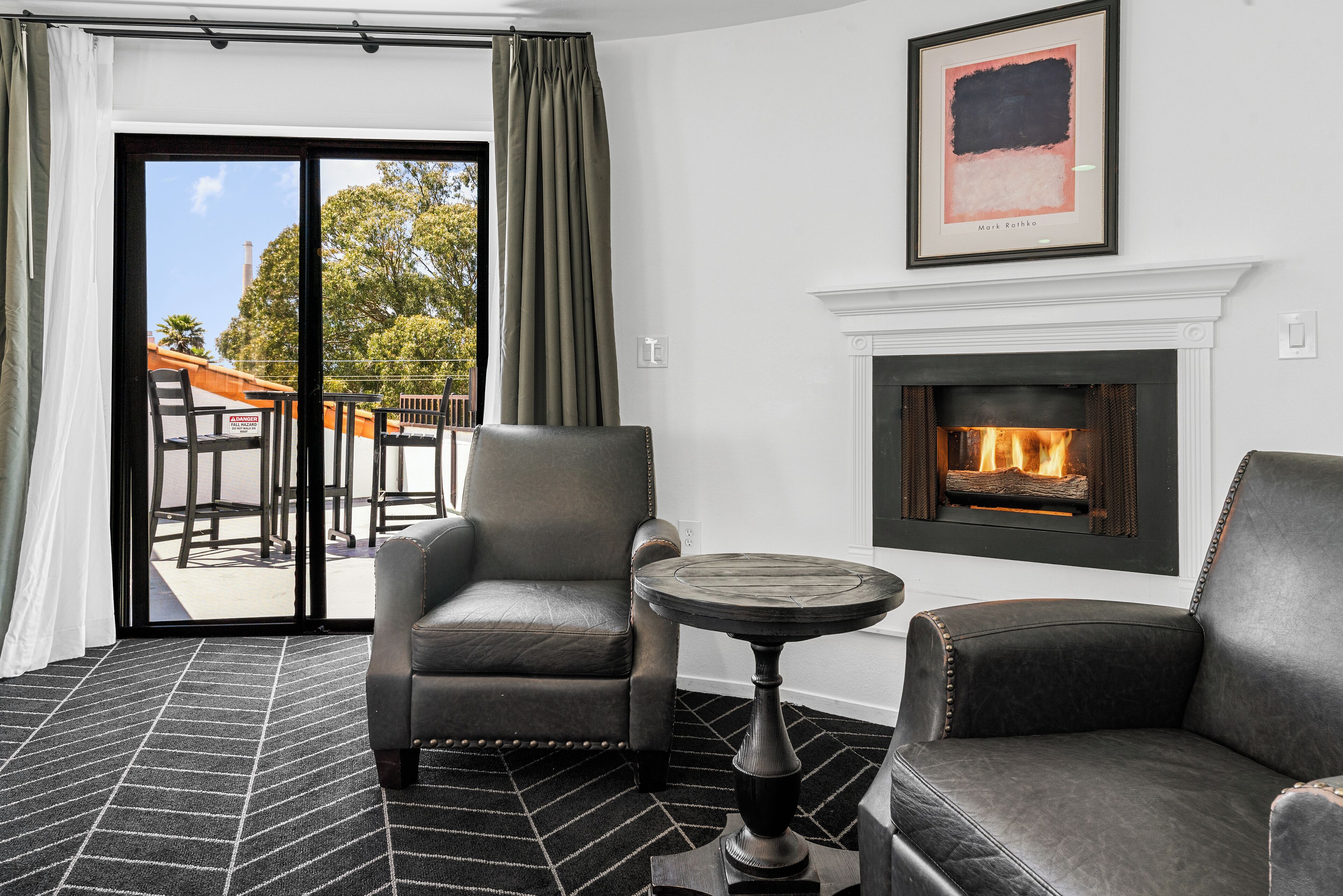 Penthouse Suite, 1 King Bed, Fireplace & Patio, Non-Smoking | Blackout drapes, iron/ironing board, free WiFi, bed sheets