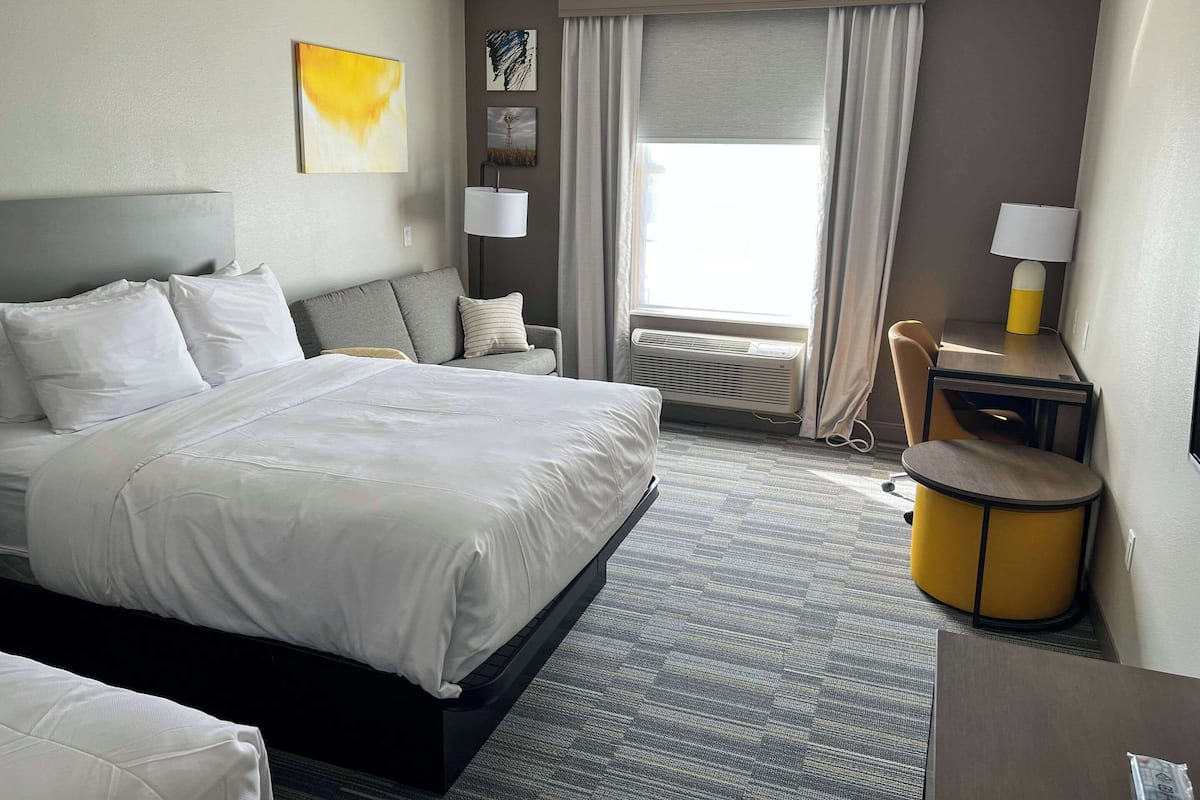 Suite, 2 Queen Beds, Non Smoking | Desk, laptop workspace, blackout curtains, iron/ironing board