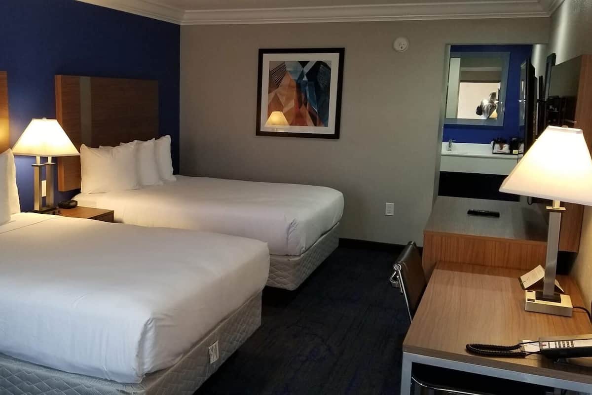 Premium bedding, pillowtop beds, desk, laptop workspace