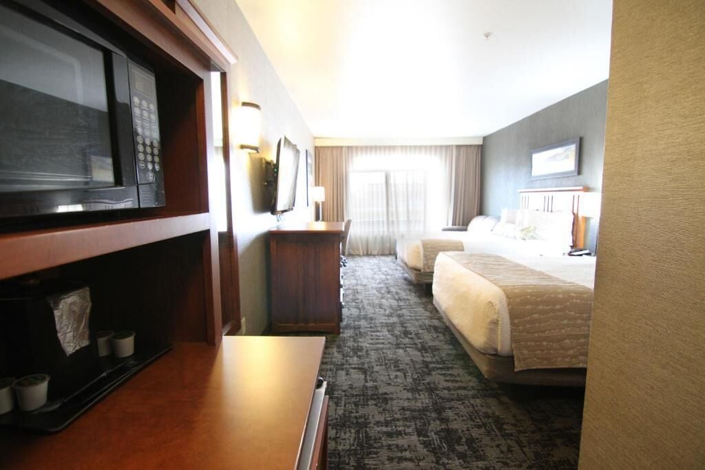 desk, blackout curtains, iron/ironing board, free cots/infant beds