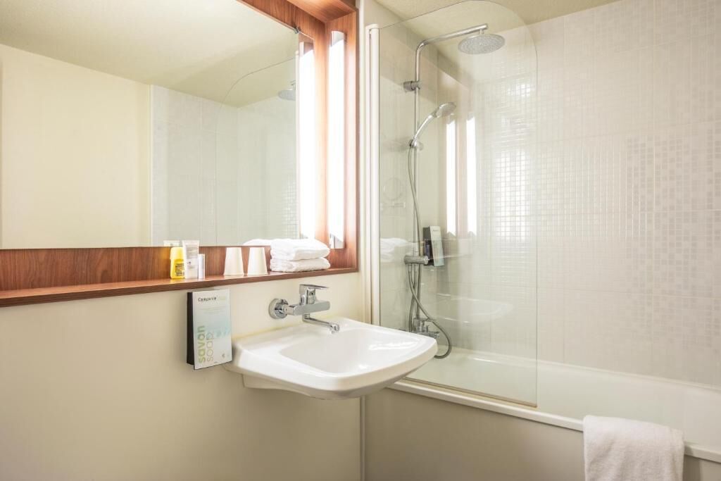 Eco-friendly toiletries, hair dryer, towels
