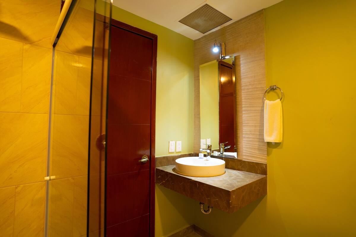 junior double room | bathroom | shower, free toiletries, hair dryer, towels