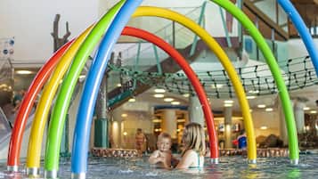 Children can play and interact with water features in this indoor water play area.