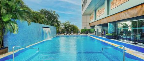 Outdoor pool, open 6:00 AM to 11 PM, free pool cabanas, pool umbrellas