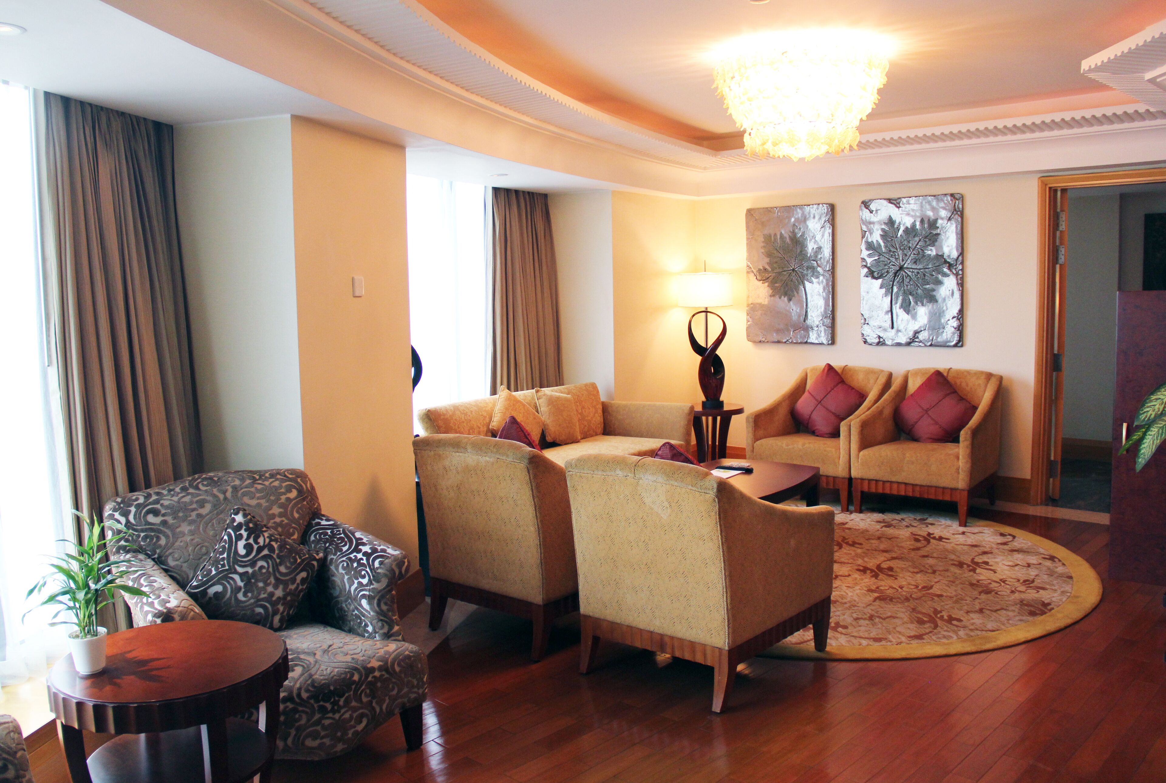 presidential suite, 1 king bed with sofa bed, city view, poolside (city view) | living room | 32-inch lcd tv with satellite channels, smart tv