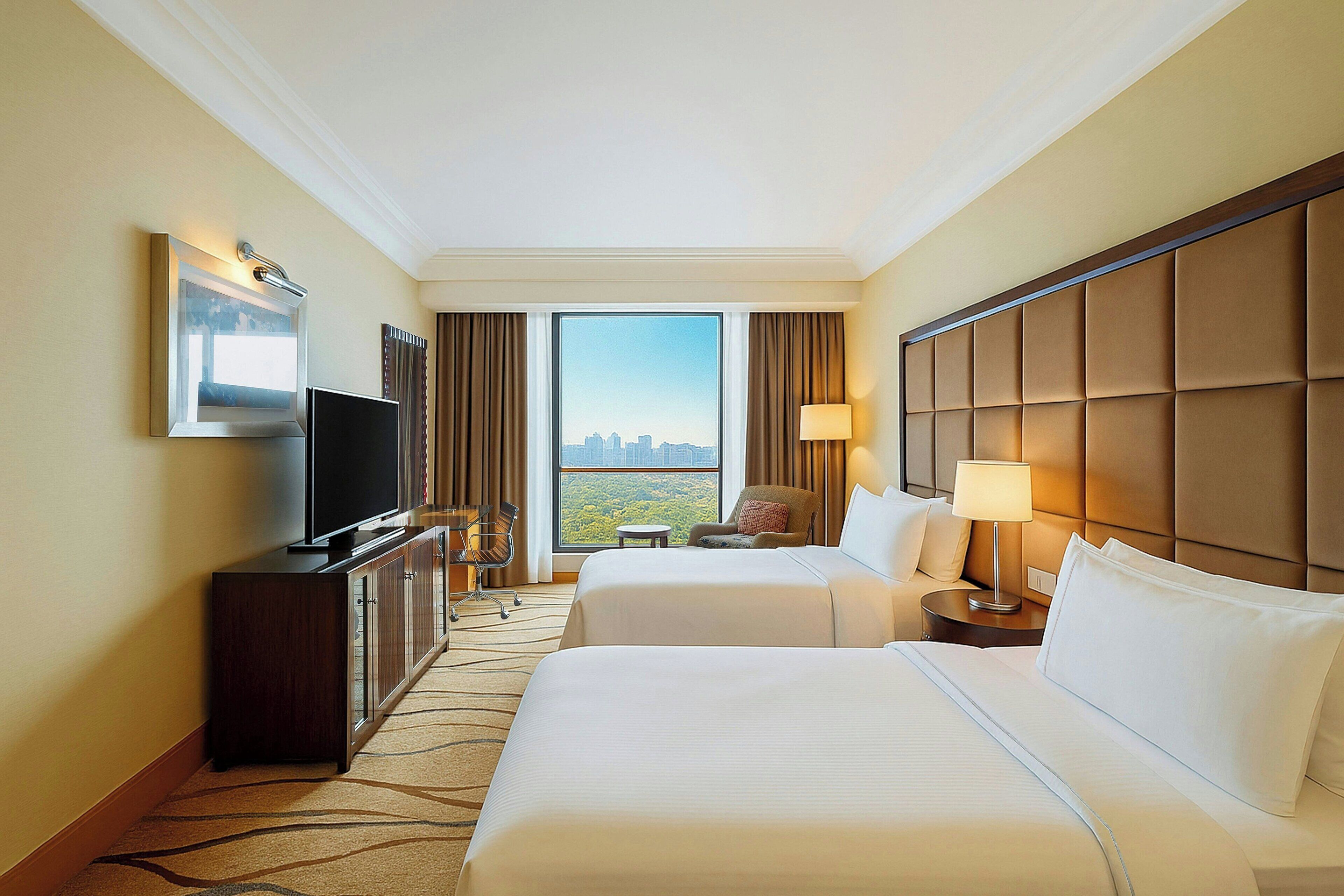 Deluxe Twin Room, 2 Single Beds, City View, Poolside | Down duvets, pillow-top beds, minibar, in-room safe