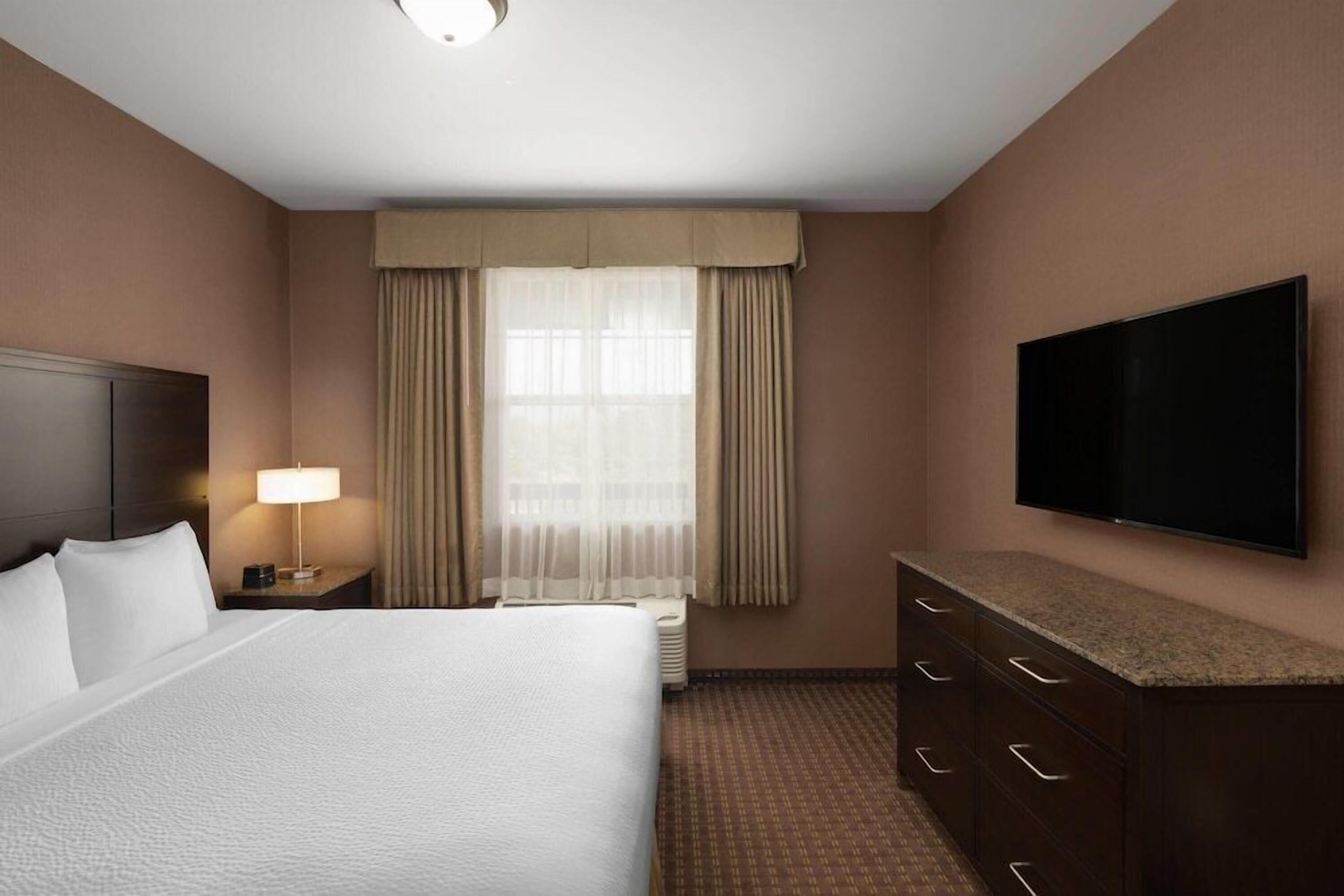 Premium bedding, pillow-top beds, in-room safe, desk