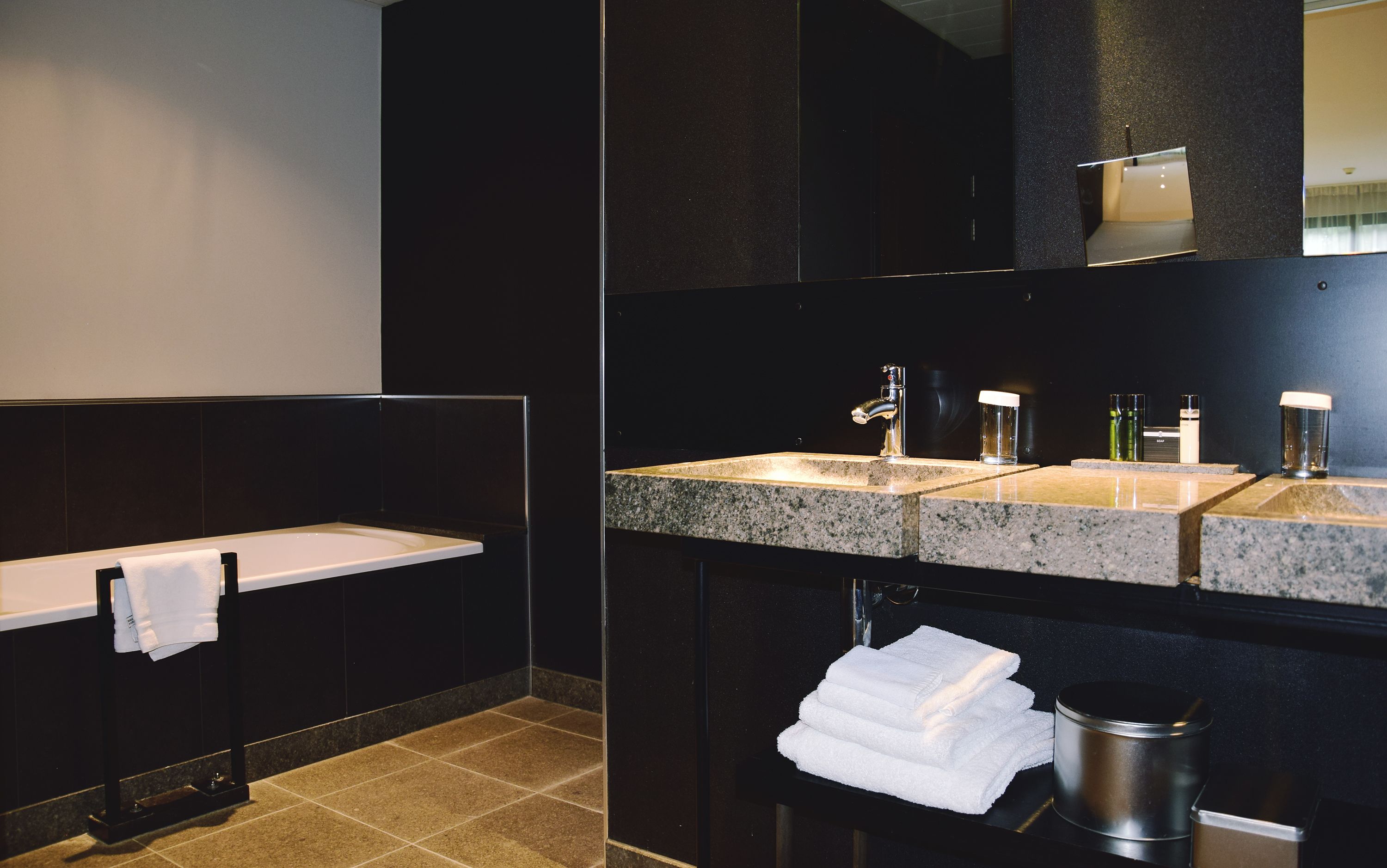 suite, 1 king bed | bathroom | separate bathtub and shower, designer toiletries, hair dryer, bathrobes
