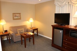 Suite, 2 Queen Beds (Two-Room Suite N/S) | Living room | 32-inch flat-screen TV with satellite channels, TV - The Village Inn Harrisonburg (Harrisonburg)