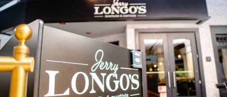 A storefront with a sign reading "Jerry Longo's meatballs & martinis."