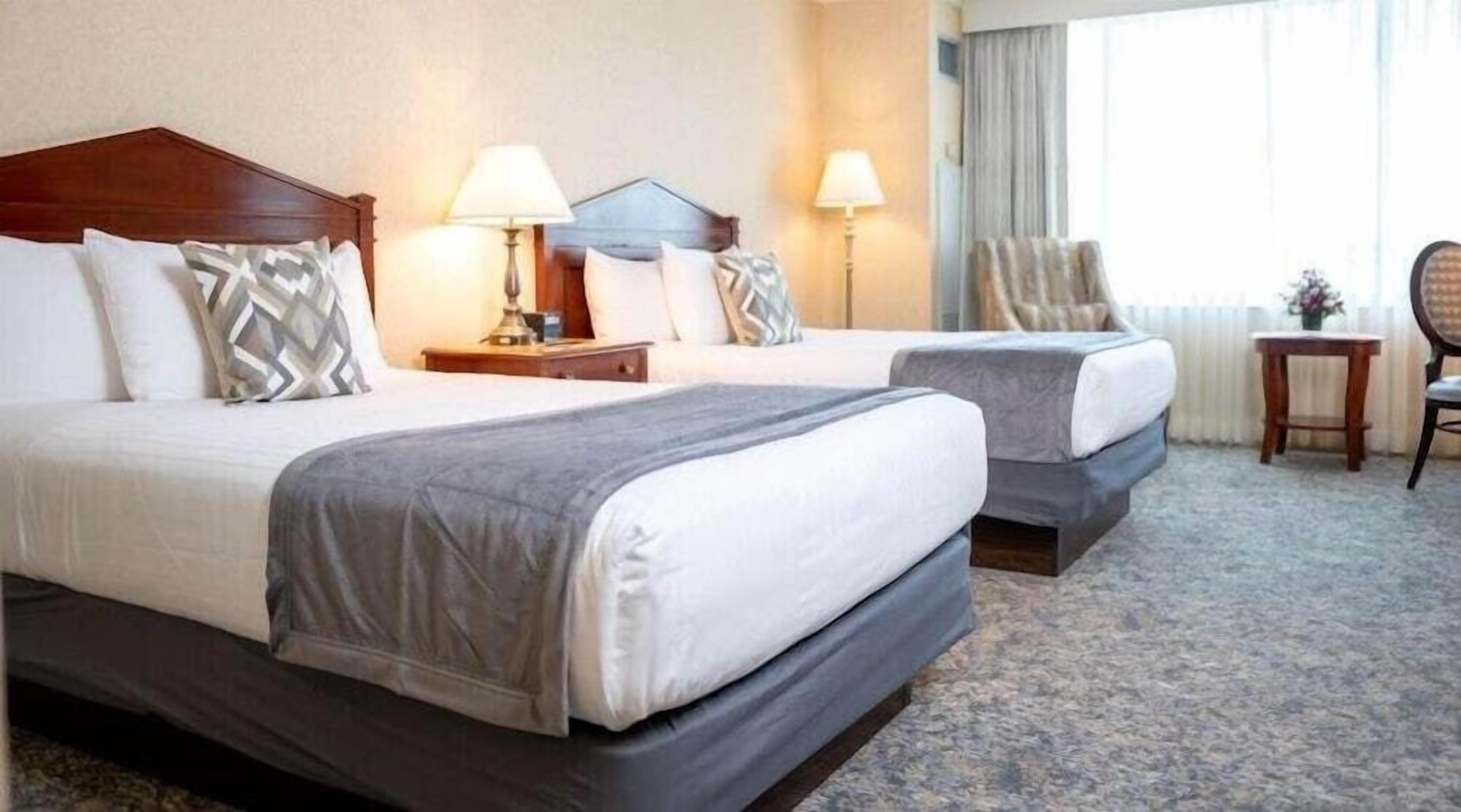 Premium bedding, pillow-top beds, in-room safe, desk
