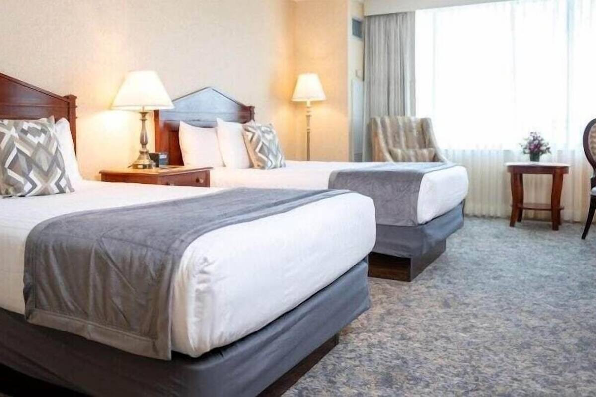 Ropa de cama de alta calidad y camas con pillow-top