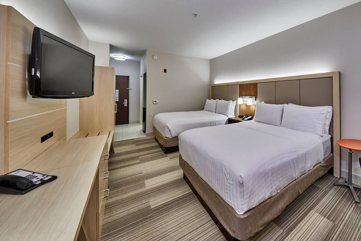 In-room safe, desk, iron/ironing board, cribs (free)