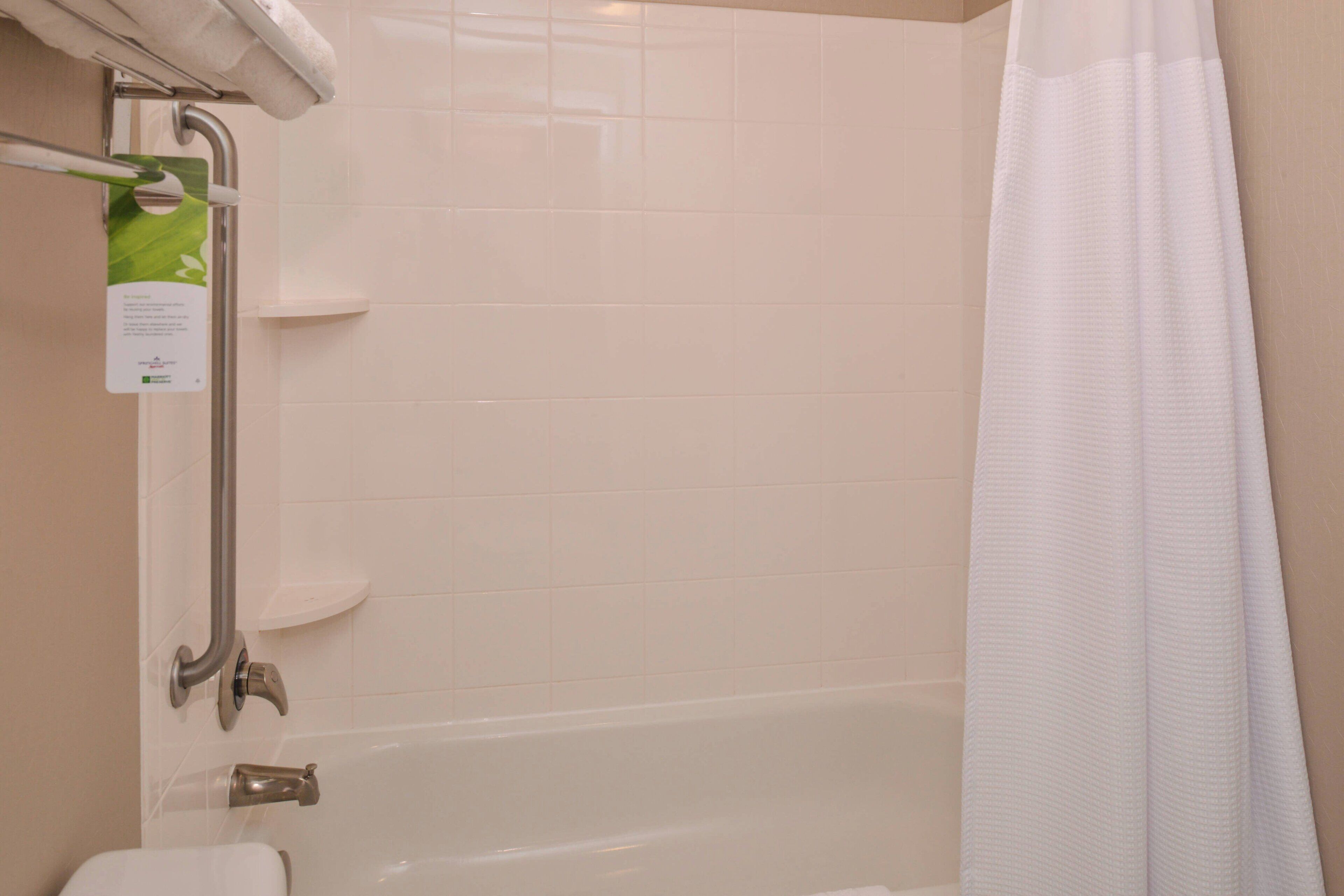 combined shower/bathtub, free toiletries, hair dryer, towels