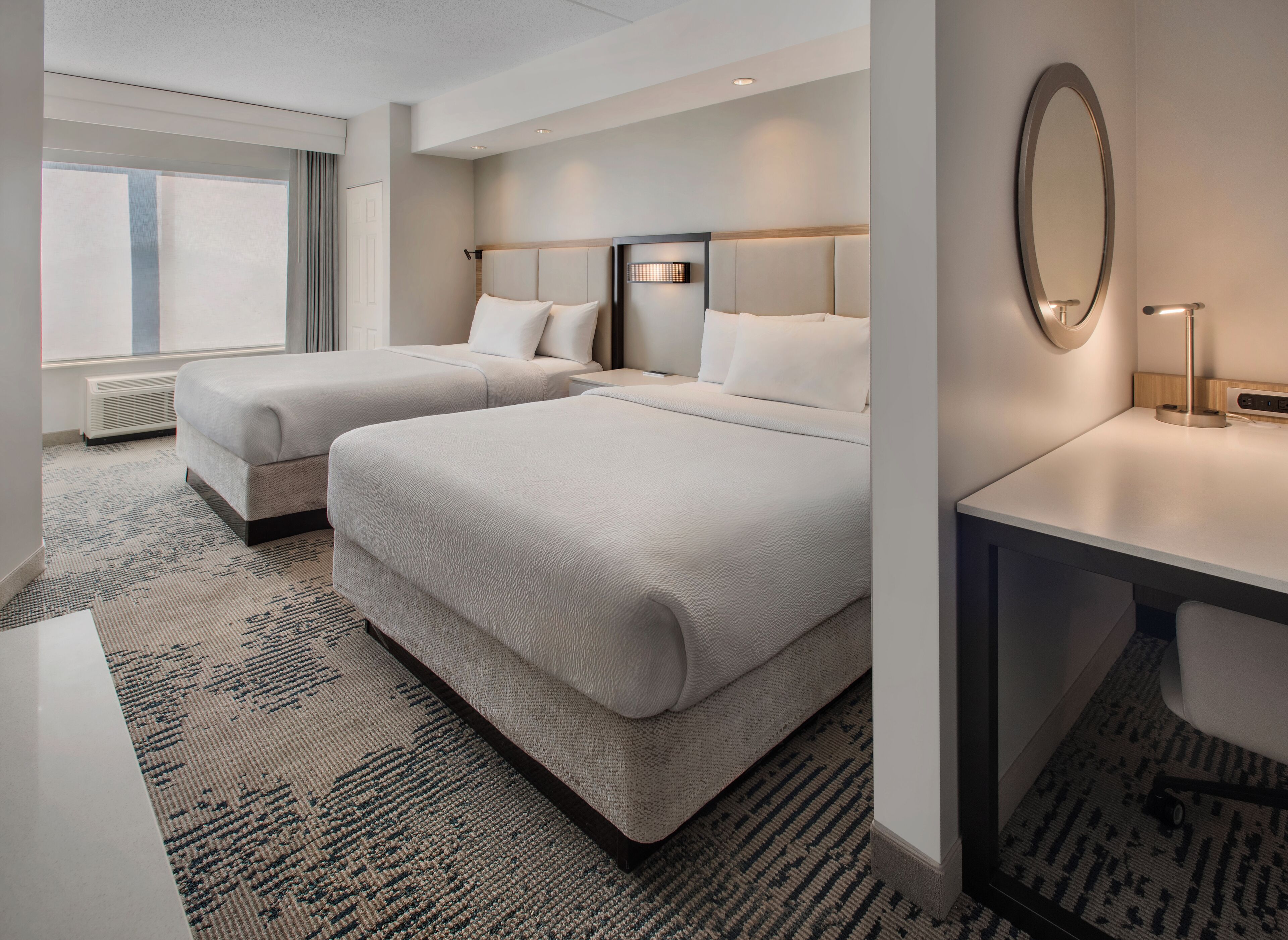 Premium bedding, desk, blackout drapes, iron/ironing board