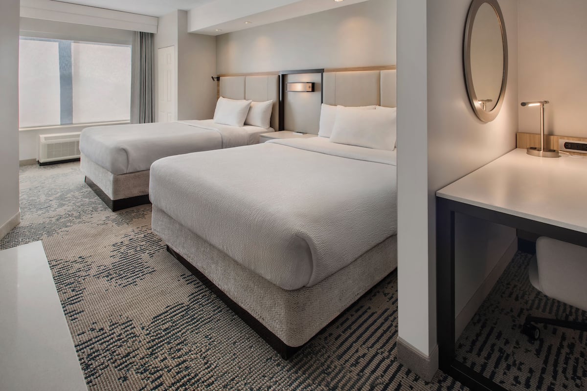 Premium bedding, desk, blackout drapes, iron/ironing board