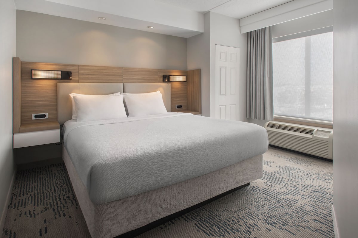 Premium bedding, desk, blackout drapes, iron/ironing board