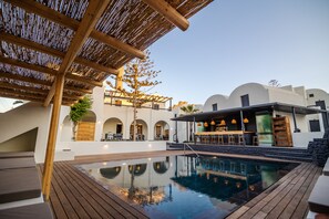 Seasonal outdoor pool, pool loungers