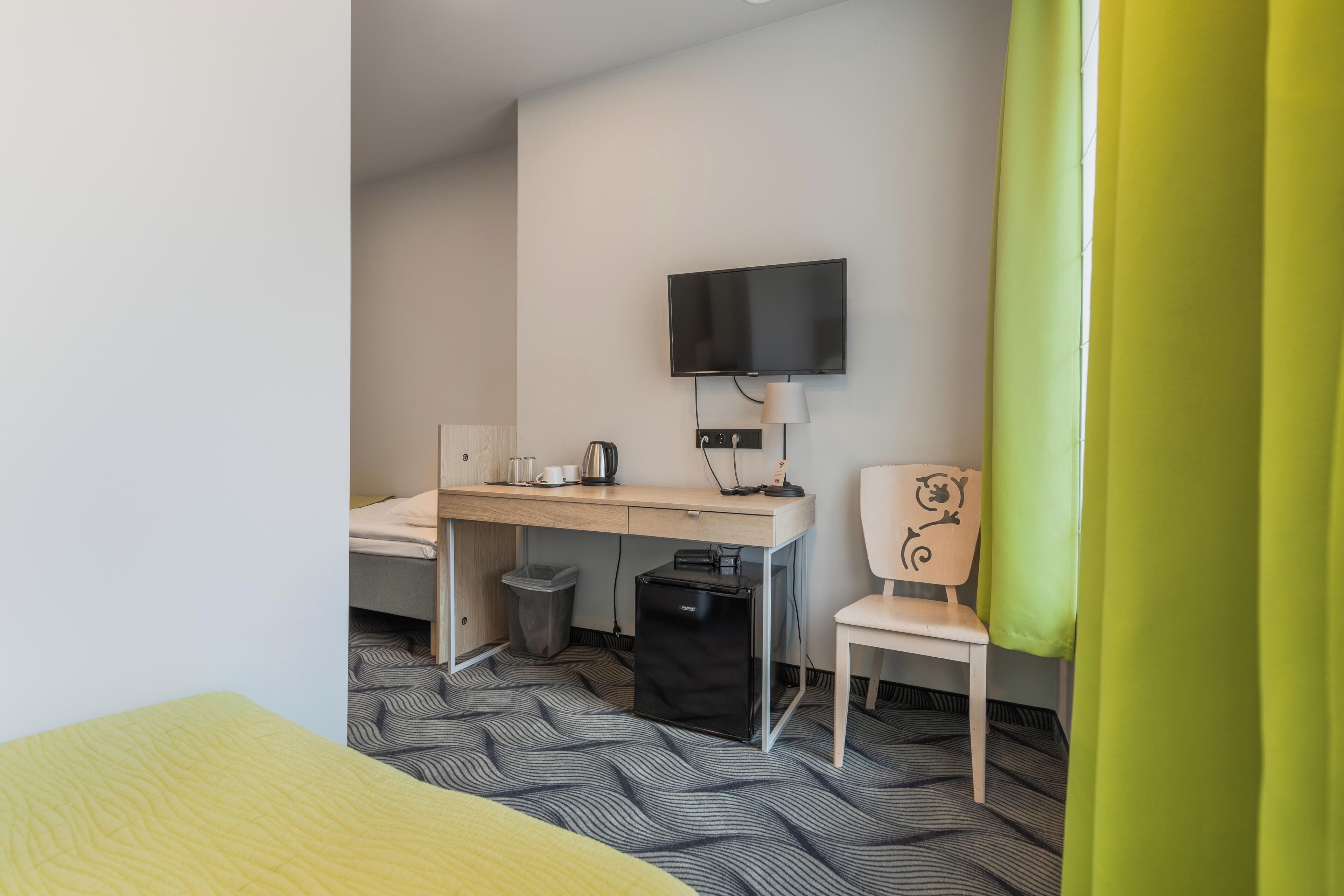 economy twin room | minibar, in-room safe, desk, blackout curtains