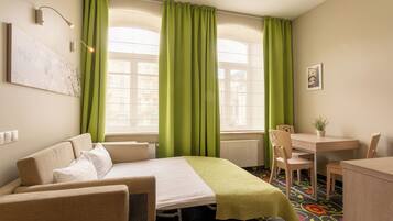 Apartment, 1 Bedroom, Kitchen | Minibar, in-room safe, desk, blackout drapes