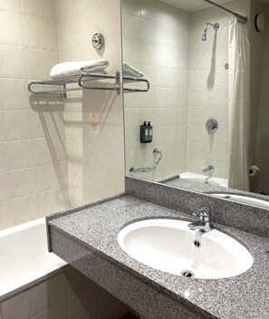 Eco-friendly toiletries, hair dryer, towels