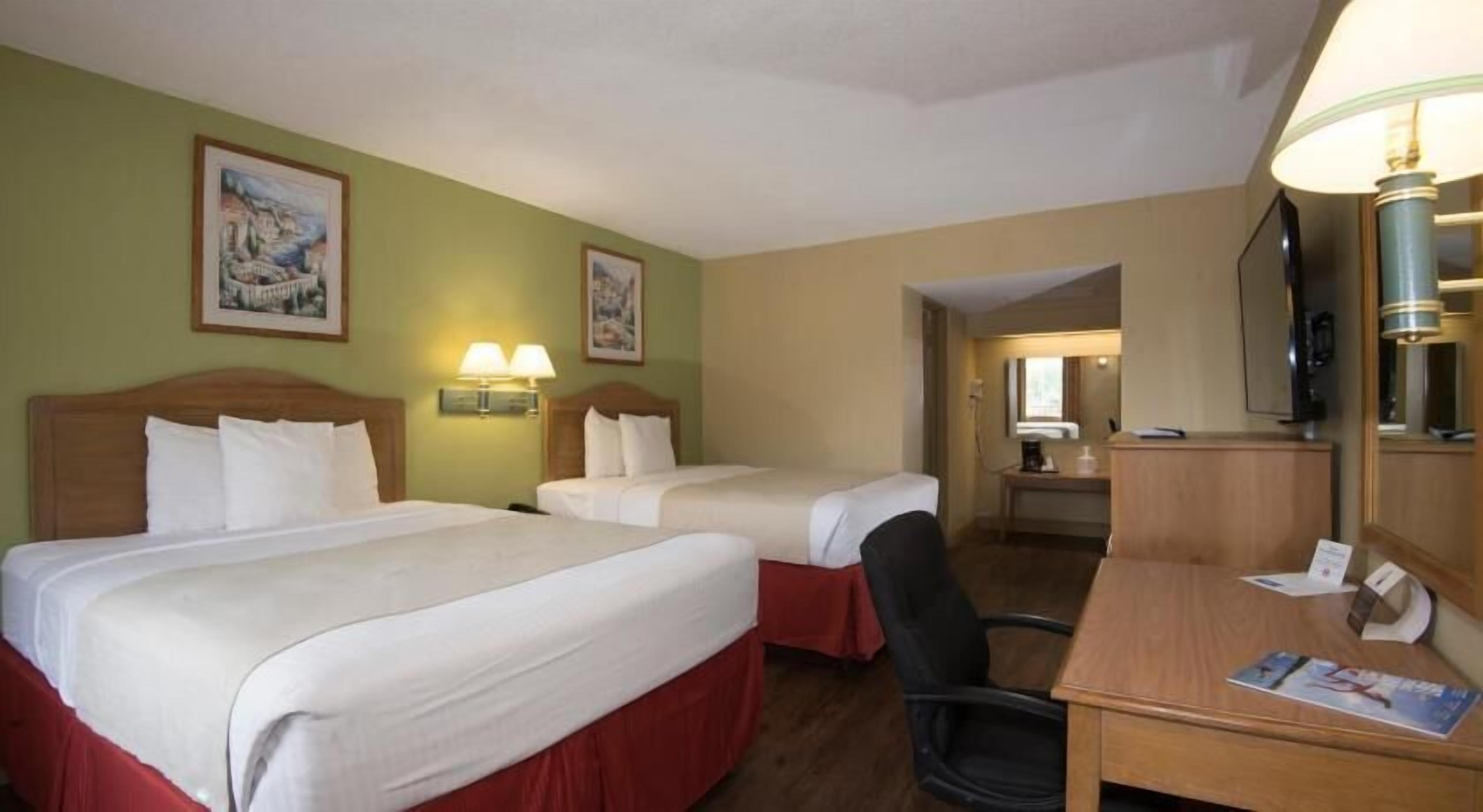 Pillowtop beds, desk, iron/ironing board, free cribs/infant beds