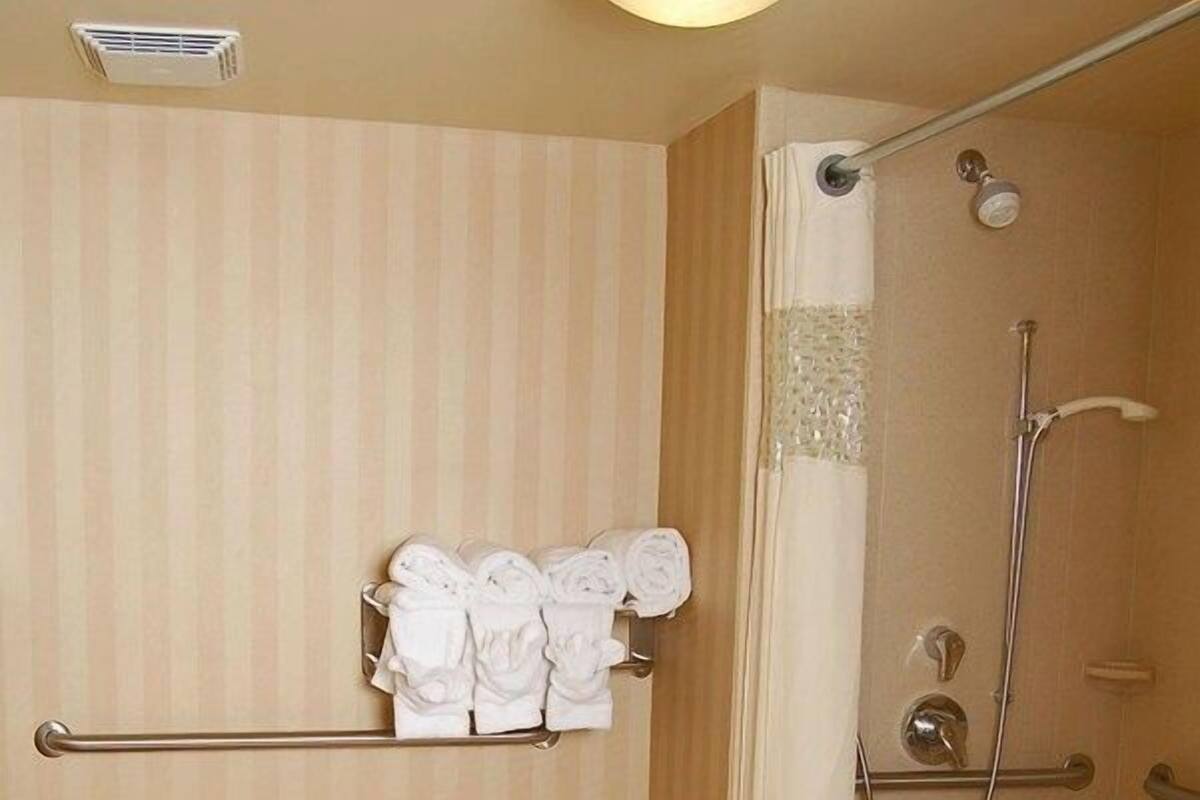 Bathroom | Bathtub, hair dryer, towels